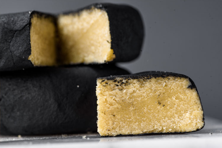 Vegan aged Cheese with Ashes. 